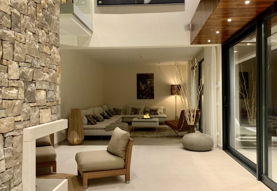 Living room along the stone wall